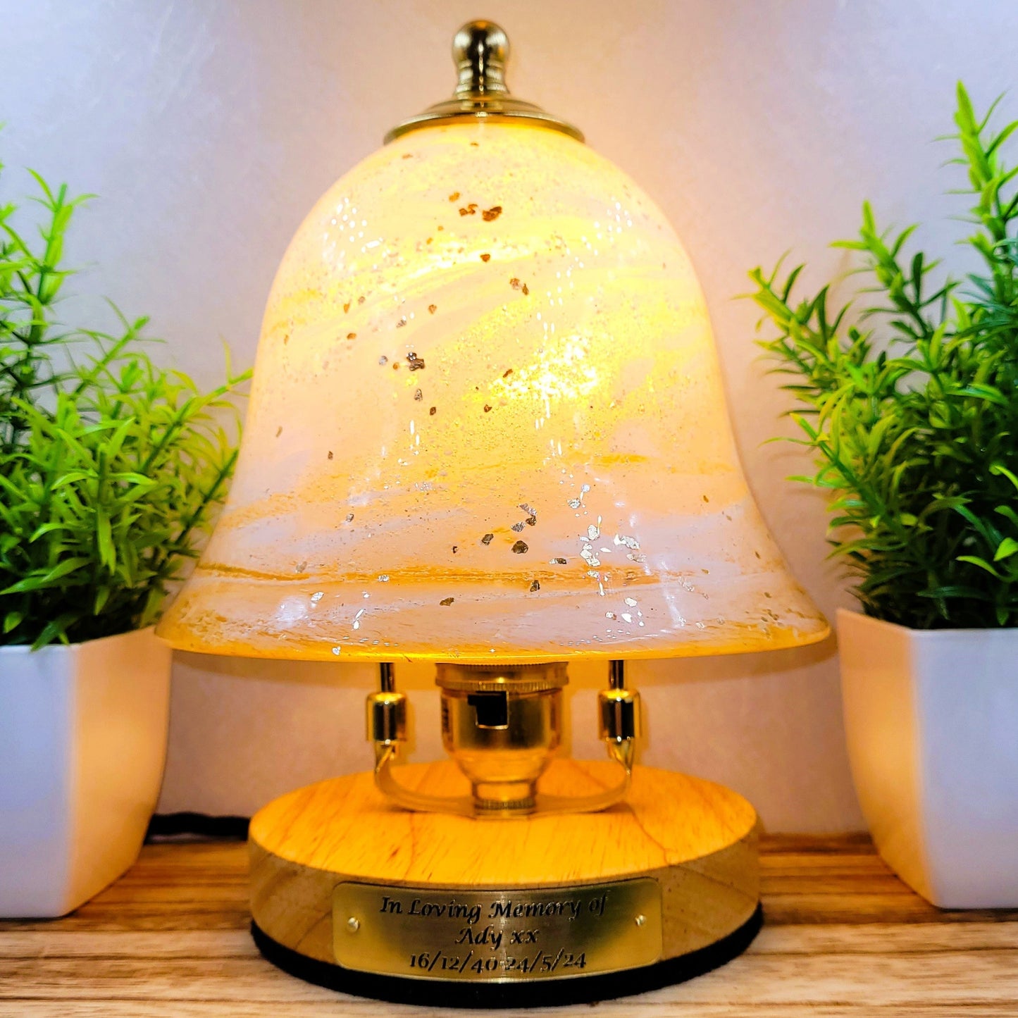Ashes in glass table lamp